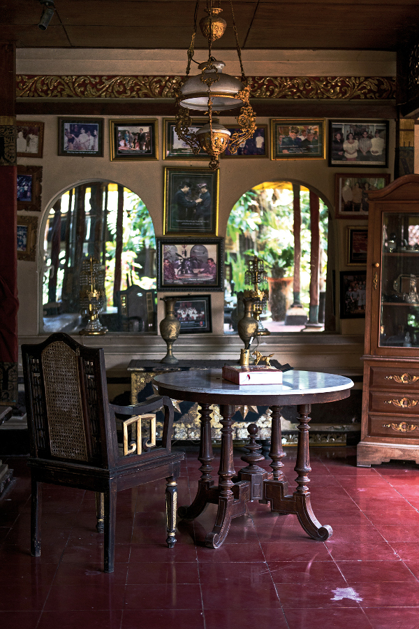 An antique home with a wall full of memories