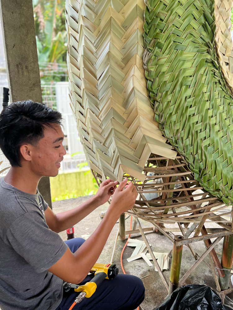 Chloe-Quinn-with-a-leaf-weaved-snail---photo-courtesy-of-Make-a-Scene-Bali